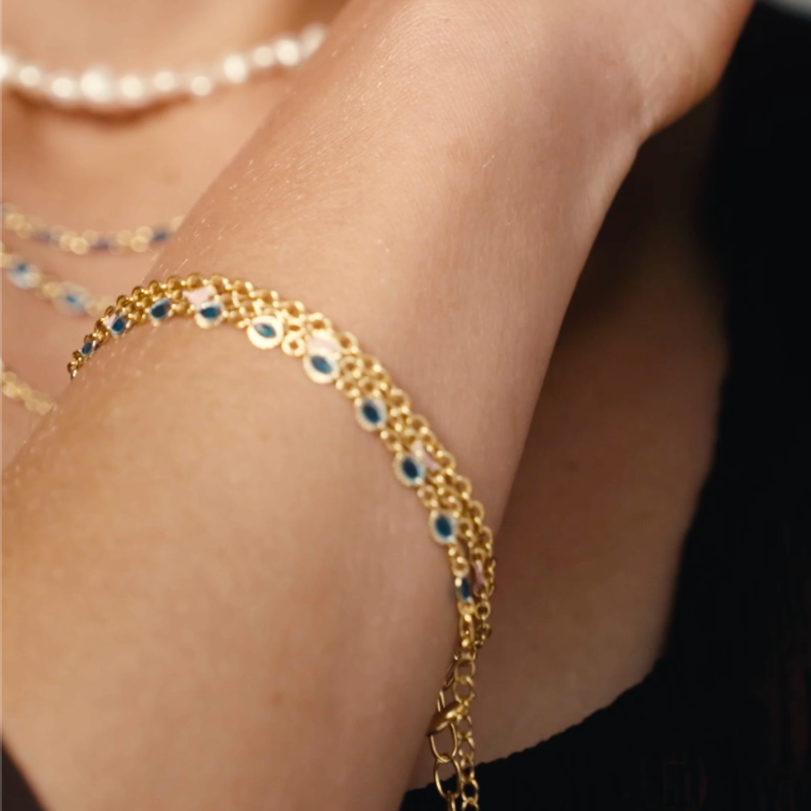 Armband gyllt og grænblátt