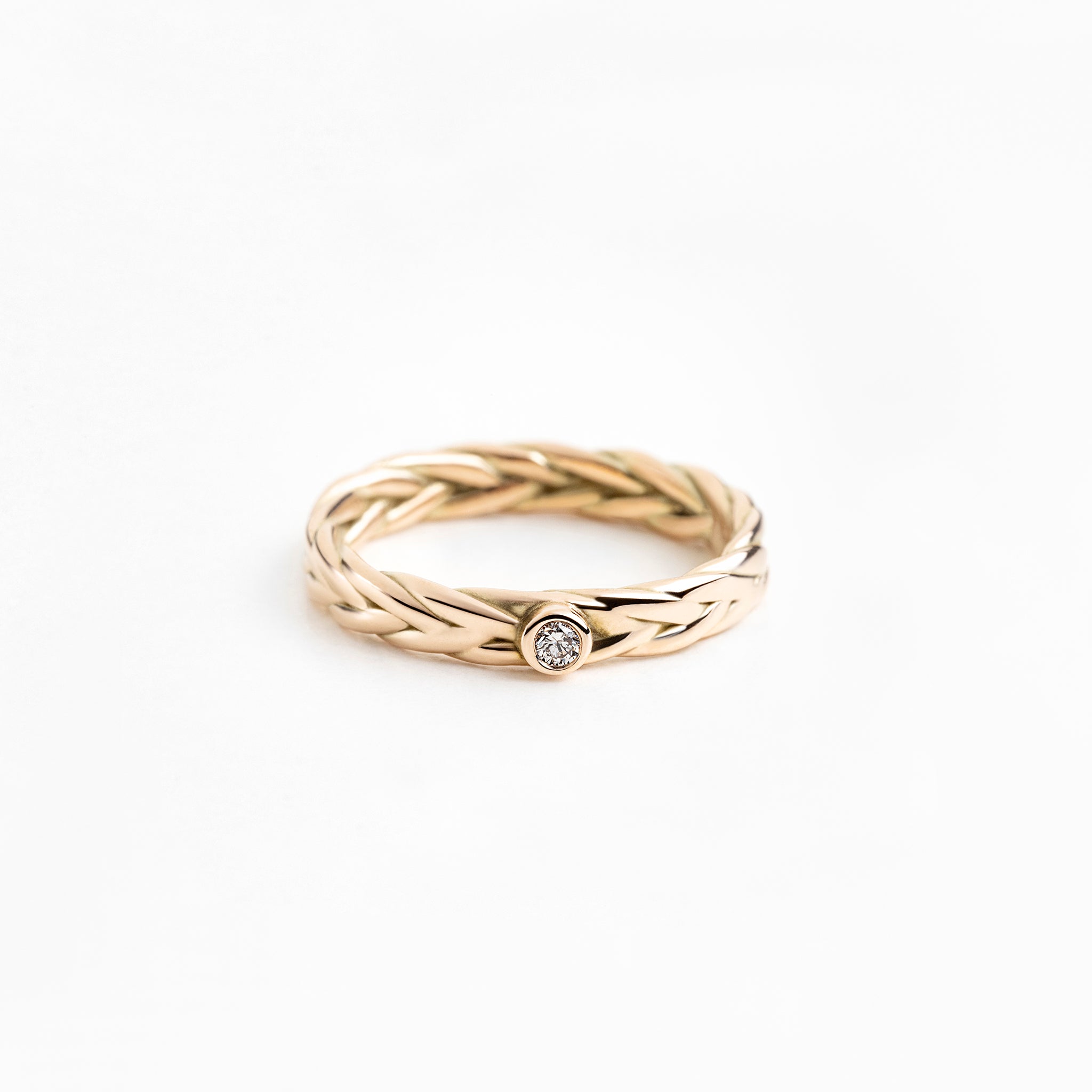 Hringur fiskiflétta með demanti 14kt gull