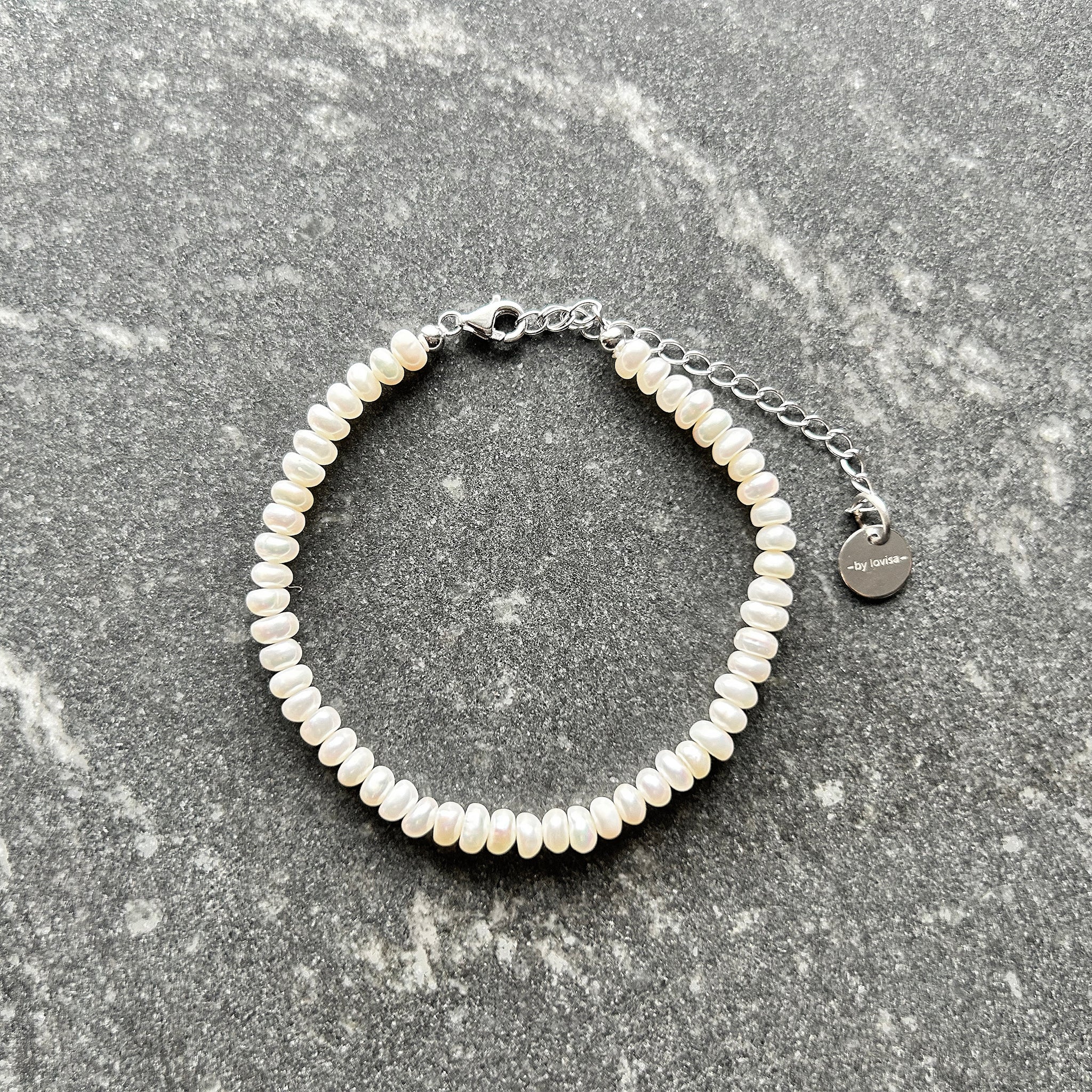 perluarmband silfur