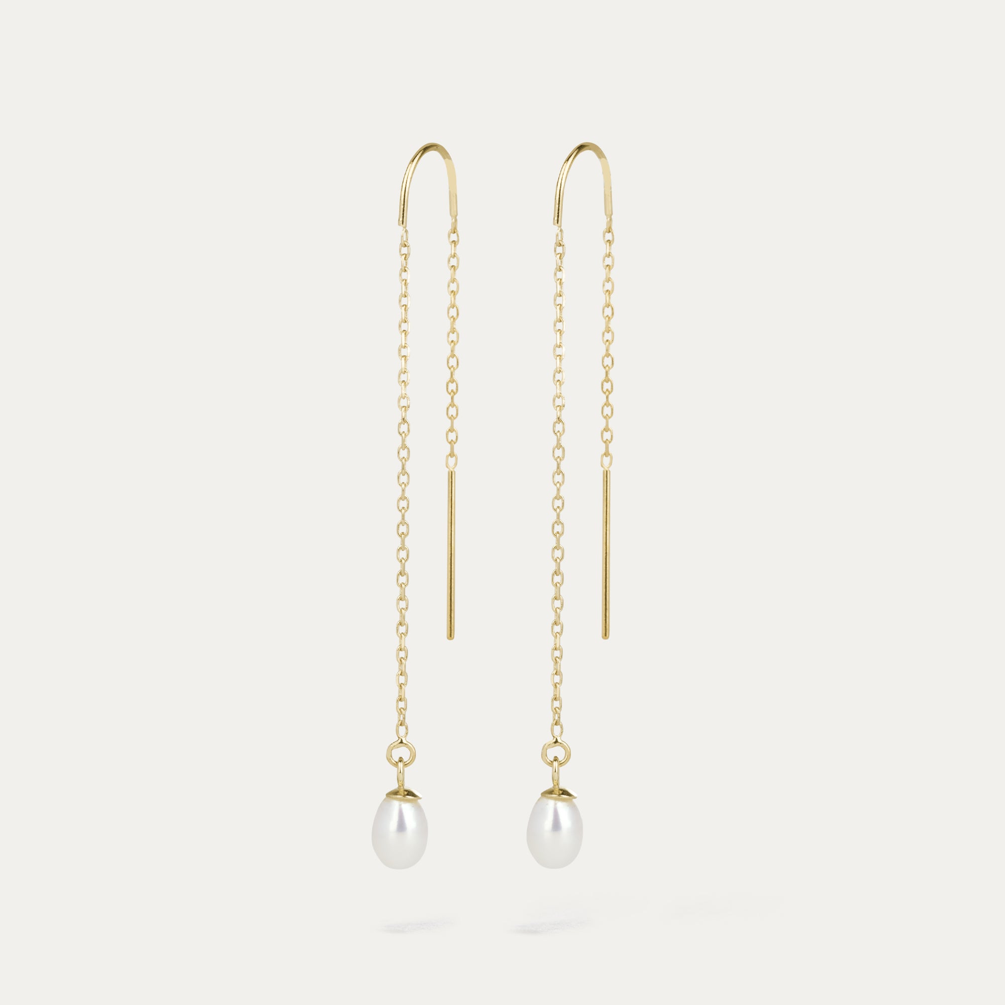 Eyrnalokkar úr 14kt gulli með perlu