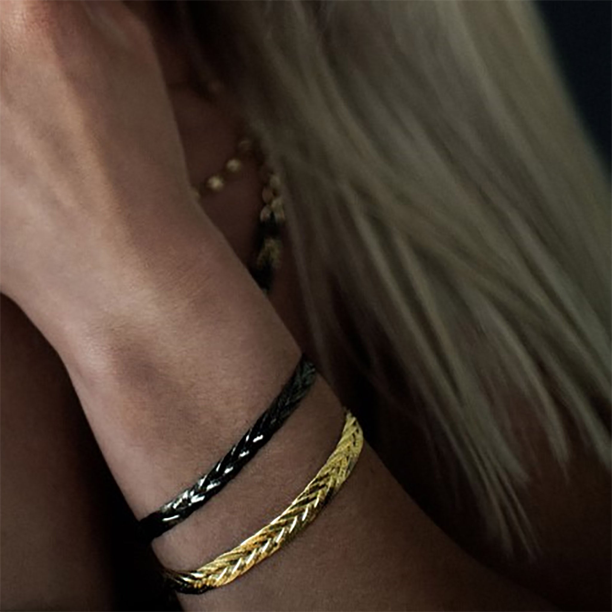 armband fiskiflétta gyllt