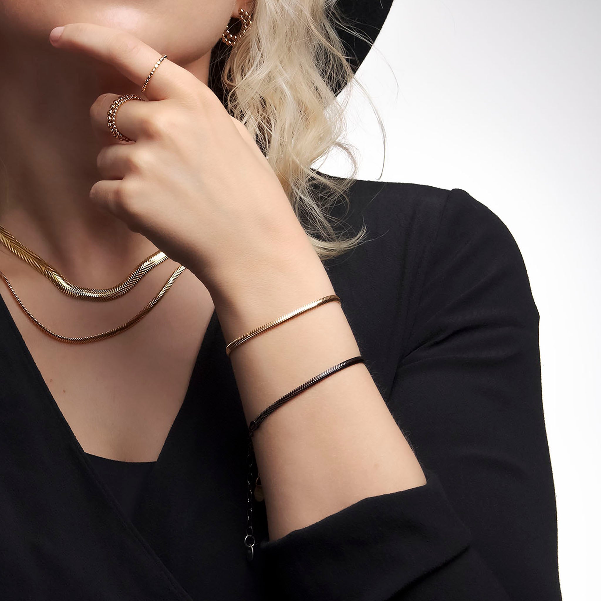 armband hrygg svart og gyllt