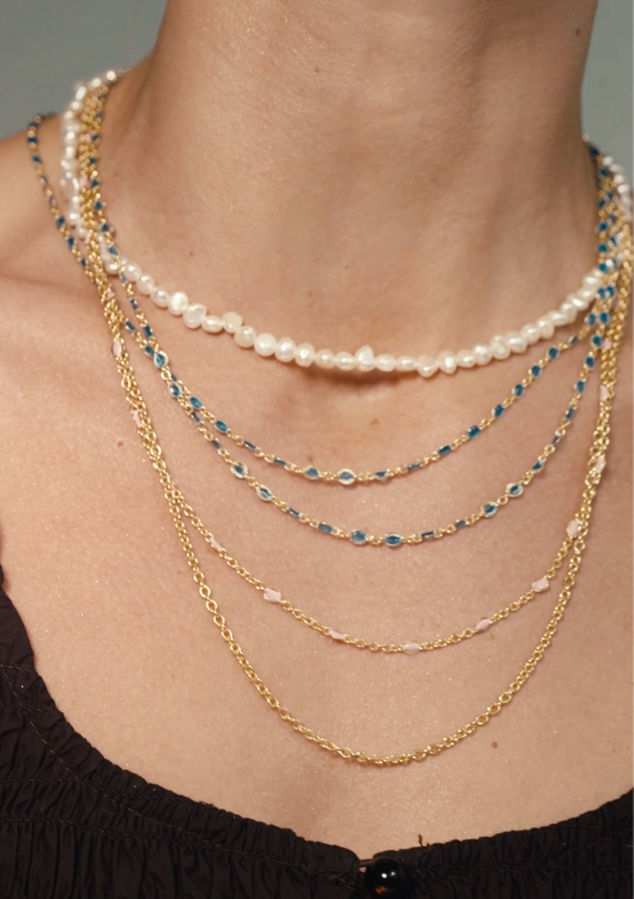 Hálsfesti gyllt og grænblá