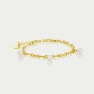 armband með þremur perlum gyllt